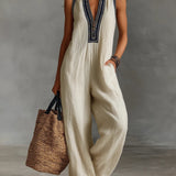 Fiamma - Sleeveless Jumpsuit with Minimalist High Collar and Zip