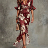 Anna - Asymmetrical long dress in green satin with V-neck, flared puff sleeves, and floral pattern